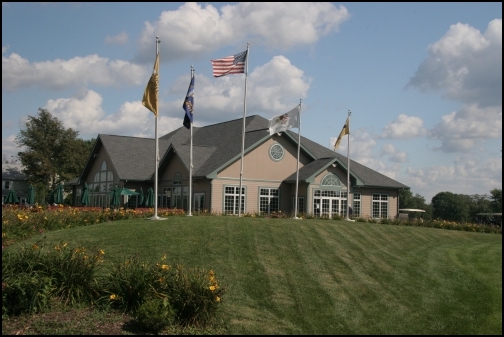 University Park Golf Club clubhouse small image with flags